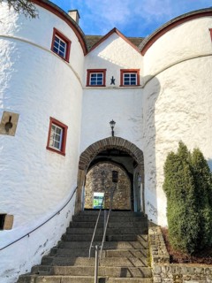 View of stairs to east gate passage into preserved inhabited bailey of medieval hill castle