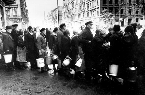 Supplying the population after surrender, civilians waiting in line to fetch water, Berlin May