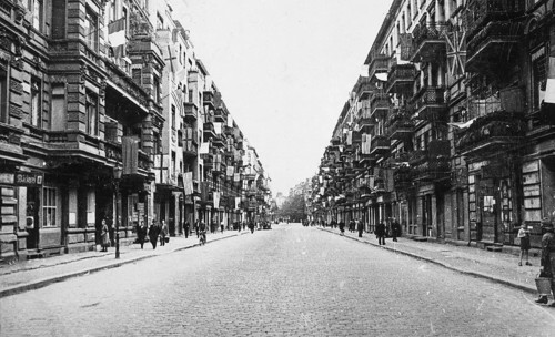 Street in Berlin, Allied flags and white flags hanging on the buildings, end of June 1945