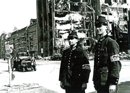 Two policemen, destroyed house, Berlin, Germany, June 1945