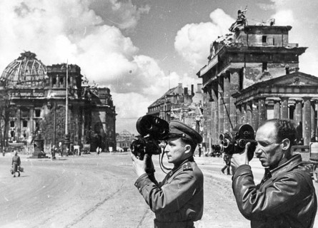 Soviet reporters, journalists with film cameras in front of the Brandenburg Gate, June 1945,