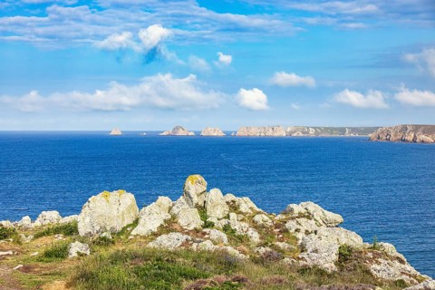 Seascape view with a rocky coastline a beautiful sunny summer day by the sea, Crozon peninsula,