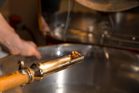 Coffee is roasted by hand in a small drum roasting machine with a lot of experience, Mrs. Müller
