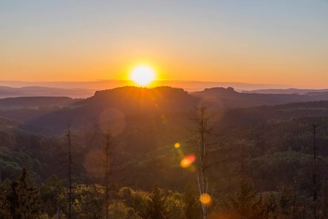 Sunrise at Bernhardstein viewpoint with views of Pfaffenstein and Gohrisch, Saxon Switzerland,