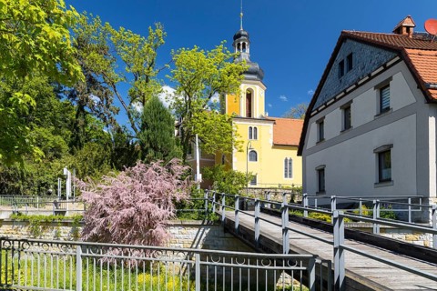 Bridge over Seidewitz and church in Zuschendorf, Pirna, Saxony, Germany