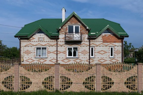 New settler house with garden fence in the former Dornfeld from 1789-1939, today Ternopillya,