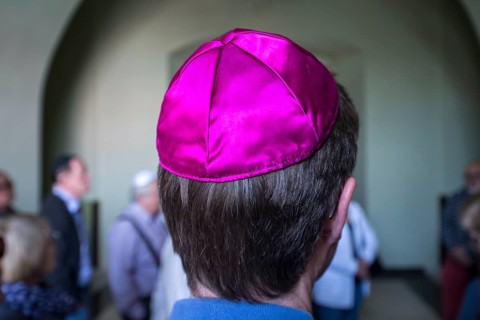 Visitor with a kippah in a synagogue, Ukraine