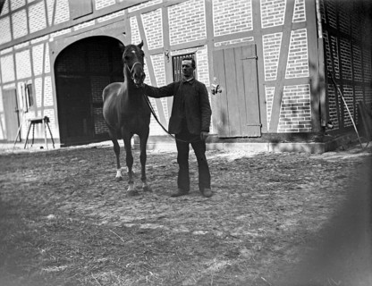 Man with horse posing for the photo, farm, ca. 1920-1930, retro, vintage, old, historic, northern