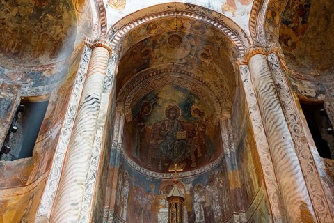 Apse with detailed frescoes and religious depiction in an ancient church, Nikorzminda Cathedral,