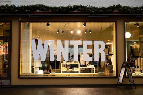Shop window with the inscription Winter, Helsinki, Finland