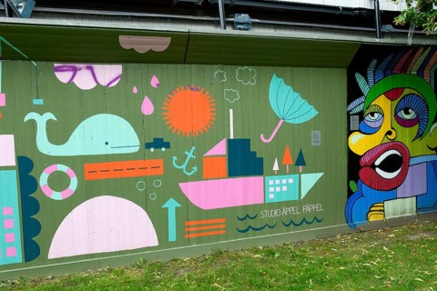 Colourful wall mural with ship, whale and creative patterns, modern art street art, Gothenburg,