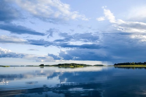 Lake Vänern near Ekenäs with sea mark on Lake Vänern, water reflects the sky, Ekenäs, Värmlandsnäs