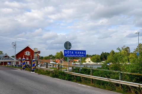 Road sign for Göta Canal in scenic area with cloudy sky, Sjötorp, Västra Götalands län, Sweden