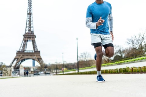 Athletic man jogging outdoors during his daily fitness workout routine, enjoying an active healthy