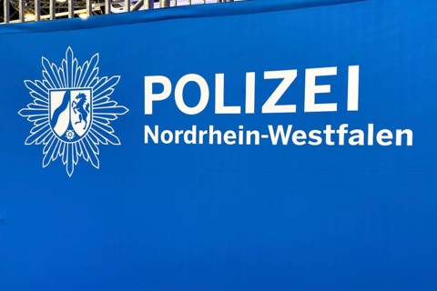 Press photo of the logo and lettering Police of North Rhine-Westphalia, Germany