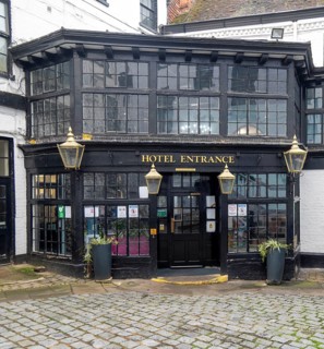 Historic doorway entrance The George Hotel, King Street, town centre of Reading, Berkshire,