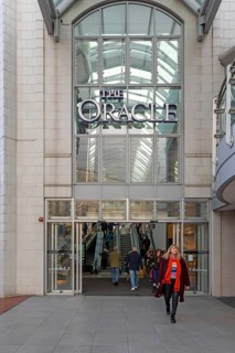 Shoppers at The Oracle shopping centre, town centre of Reading, Berkshire, England, UK