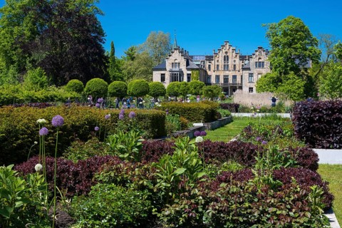 Blooming gardens at Ippenburg Castle, Bad Essen, Lower Saxony, Germany