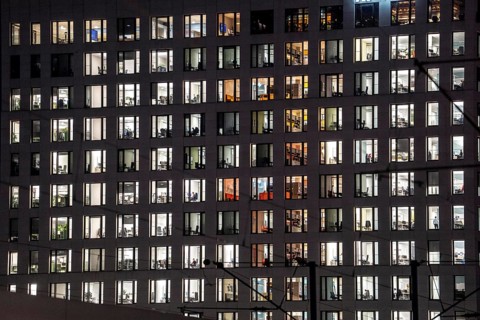 Office building, many windows are illuminated, Cologne, North Rhine-Westphalia, Germany
