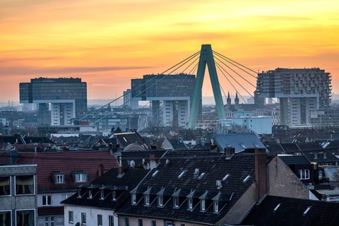 View over the city center of Cologne, residential buildings in Cologne-Deutz in front, pillar of