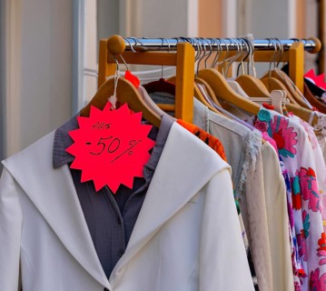 Reduced fashion, price reduction of 50 percent, fashion store in Potsdam, Brandenburg, Germany