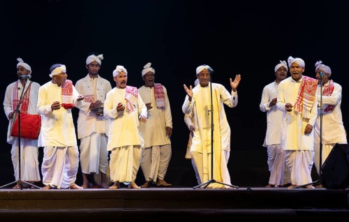 Artists perform 'Ojapali' folk song during a cultural evening program at Shilpgram Mohotsav 2026 in