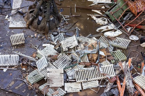 Scrap trade in a commercial port. Old radiators are ready for scrapping and recycling. Mannheim,