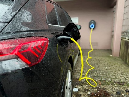 An e-car is charged at a wallbox, Wuppertal, Germany