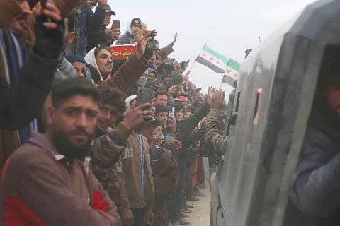 In Raqqa, Syria on January 17, 2026, local civilians are seen welcoming Syrian Army soldiers
