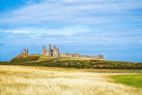 Ruins of Dunstanburgh Castle, Northumberland Coast, England, UK