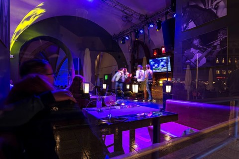 View of a karaoke bar at night, Krakow, Poland