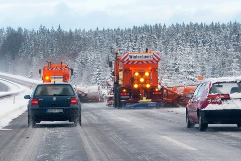 Winter maintenance, snowplow, spreader on snowy highway, Upper Bavaria, Germany