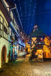 Houses illuminated and decorated for Christmas, Christmas market, blue hour, Eguisheim, Haut-Rhin