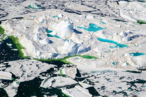 Aerial view of melting icepack and icebergs, Greenland (Kalaallit Nunaat), Arctic Ocean, climate