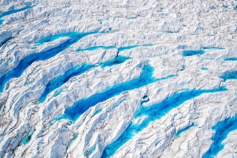Aerial view of meltwater on the Greenland ice sheet, Arctic landscape, frozen wilderness, glaciers