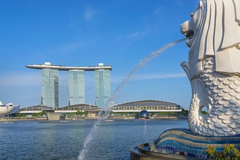 The Merlion fountain and Marina Bay Sands, MBS, luxury 5-star hotel and integrated resort in