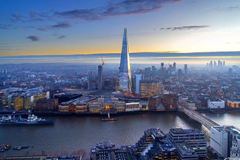 The Shard, pyramid-shaped skyscraper and London Bridge Station along the River Thames in Southwark