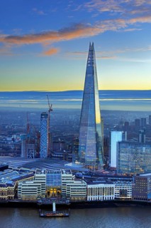 The Shard, pyramid-shaped skyscraper and London Bridge Station along the River Thames in Southwark