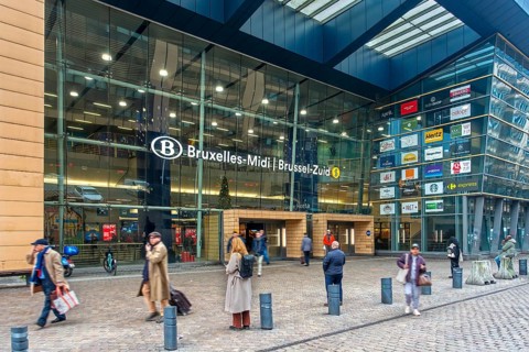 Entrance and travelers, commuters, tourists leaving the NMBS Brussels-South railway station, Gare