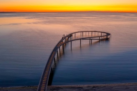 Aerial view over Maritim Seebrücke / maritime pier over the Baltic Sea at seaside resort