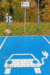 Parking area with empty public charging station / loading point from KEBA, network of chargers for