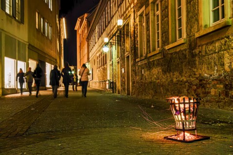 Firebaskets and passers-by set the scene during the long shopping night in the city center of