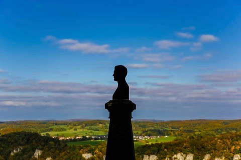 Wilhelm Hauff memorial, rocks above the Echaz Valley, monument from 1839, obelisk with bronze bust,