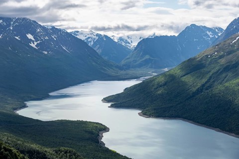View of blue lake and mountains on Twin Peaks Trail, Eklutna Lake, Chugach Mountains, Chugach State