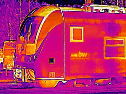 Locomotive in the train station. Thermal image or thermography, symbolic photo, interpolated.