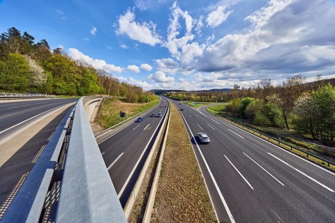 Hilly landscape, car bridges, motorway bridge, metal railings, road, motorway exit AS Bessenbach