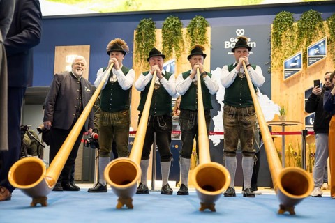 Alphorn wind players at the Bavarian stand during the opening tour of the Green Week at the