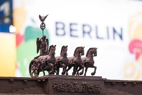 The chocolate quadriga as part of the entire Brandenburg Gate at the Berlin stand at the Green Week