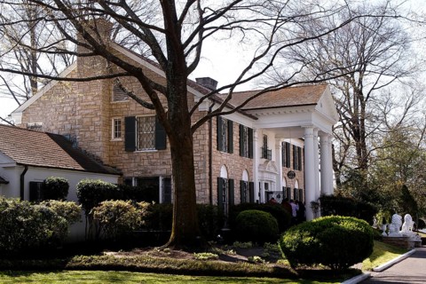 The famous Graceland estate surrounded by trees and well-kept gardens, Memphis, Tennessee, USA