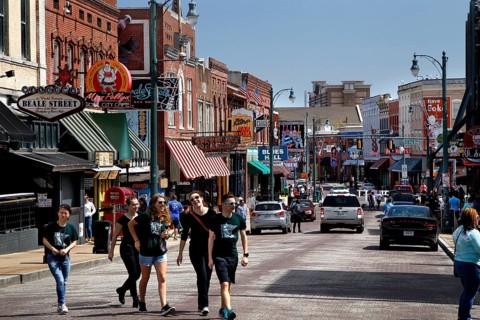 Lively walk by people on the famous Beale Street in Memphis, Memphis, Tennessee, USA